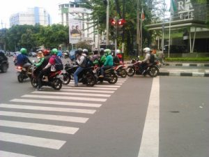 reckless actions Indonesia motorcyclists do