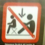Unique signs on Indonesia Commuter Train